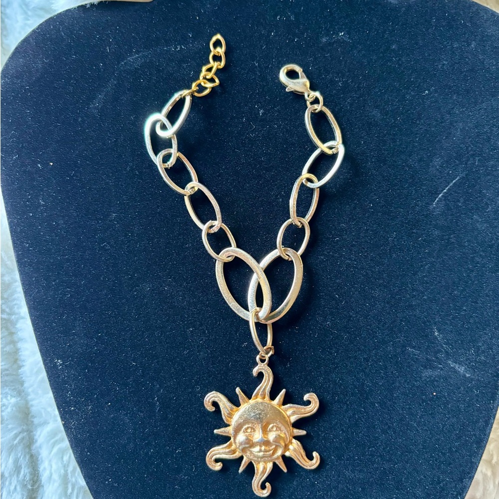 Vintage bracelet with sun charm